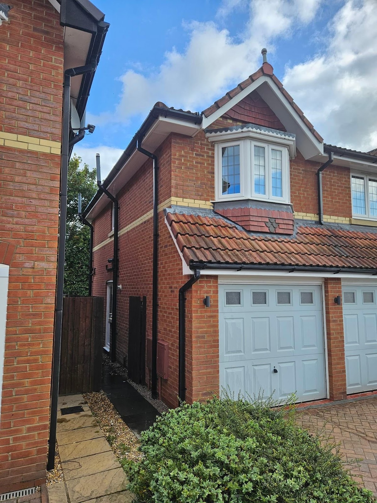 A Widnes home with freshly cleaned windows, fascias and guttering